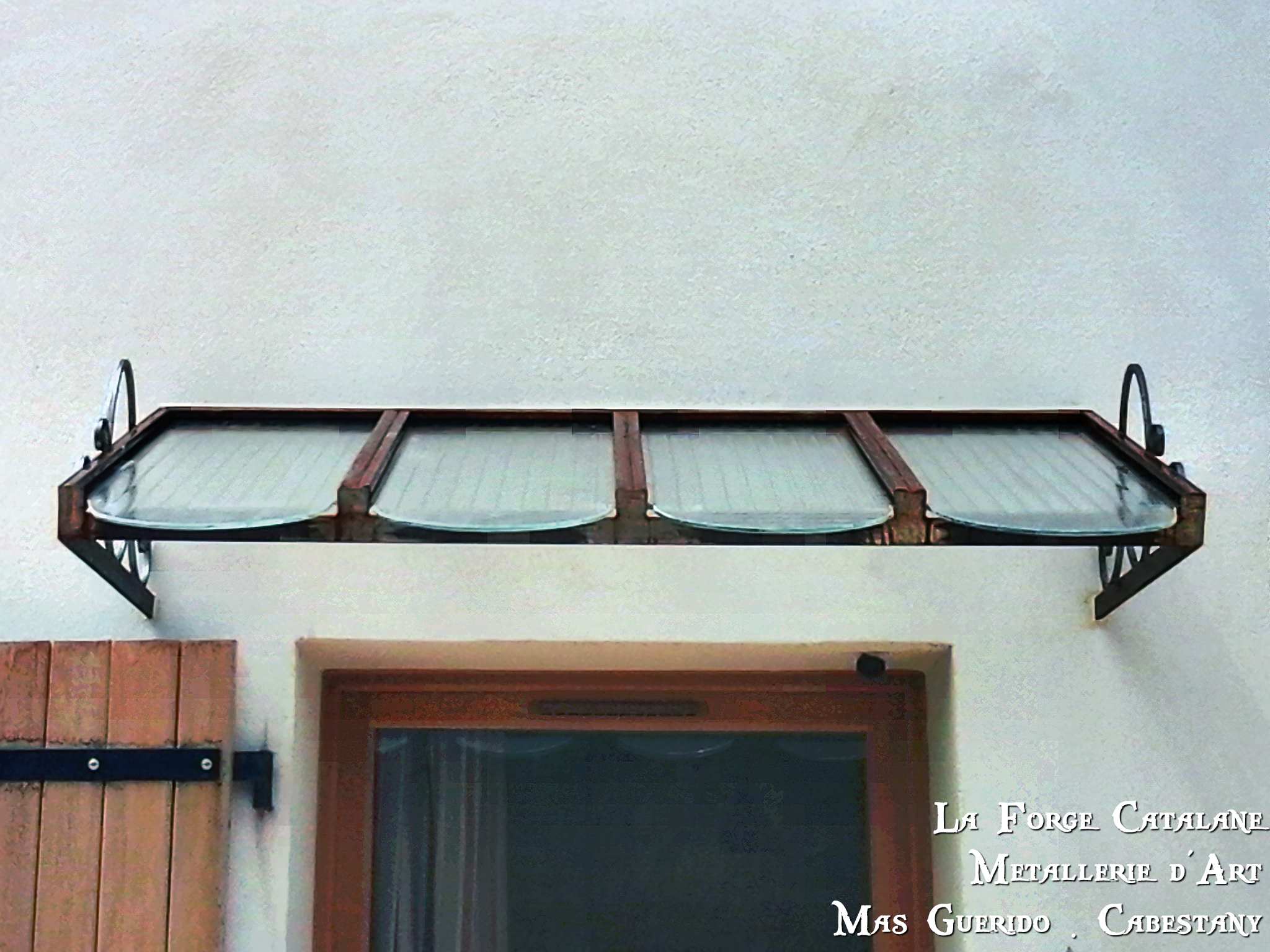 marquise type vitrage fil de fer arme motifs lateraux Forge Catalane.jpg